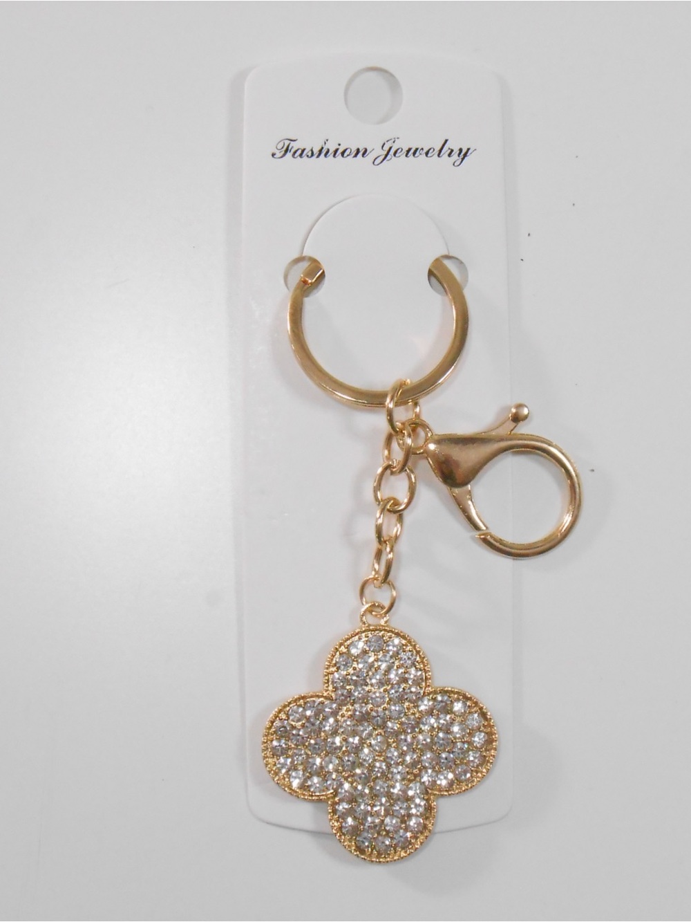 Clover-shaped keychain/bag charm gold tone